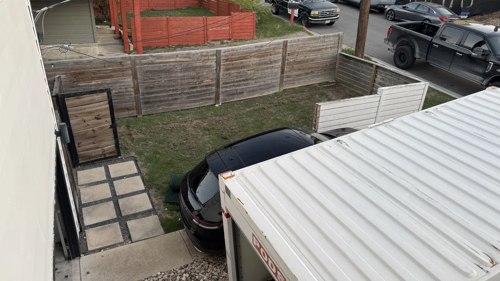 Aerial view of the unused Airbnb backyard before the turf renovation